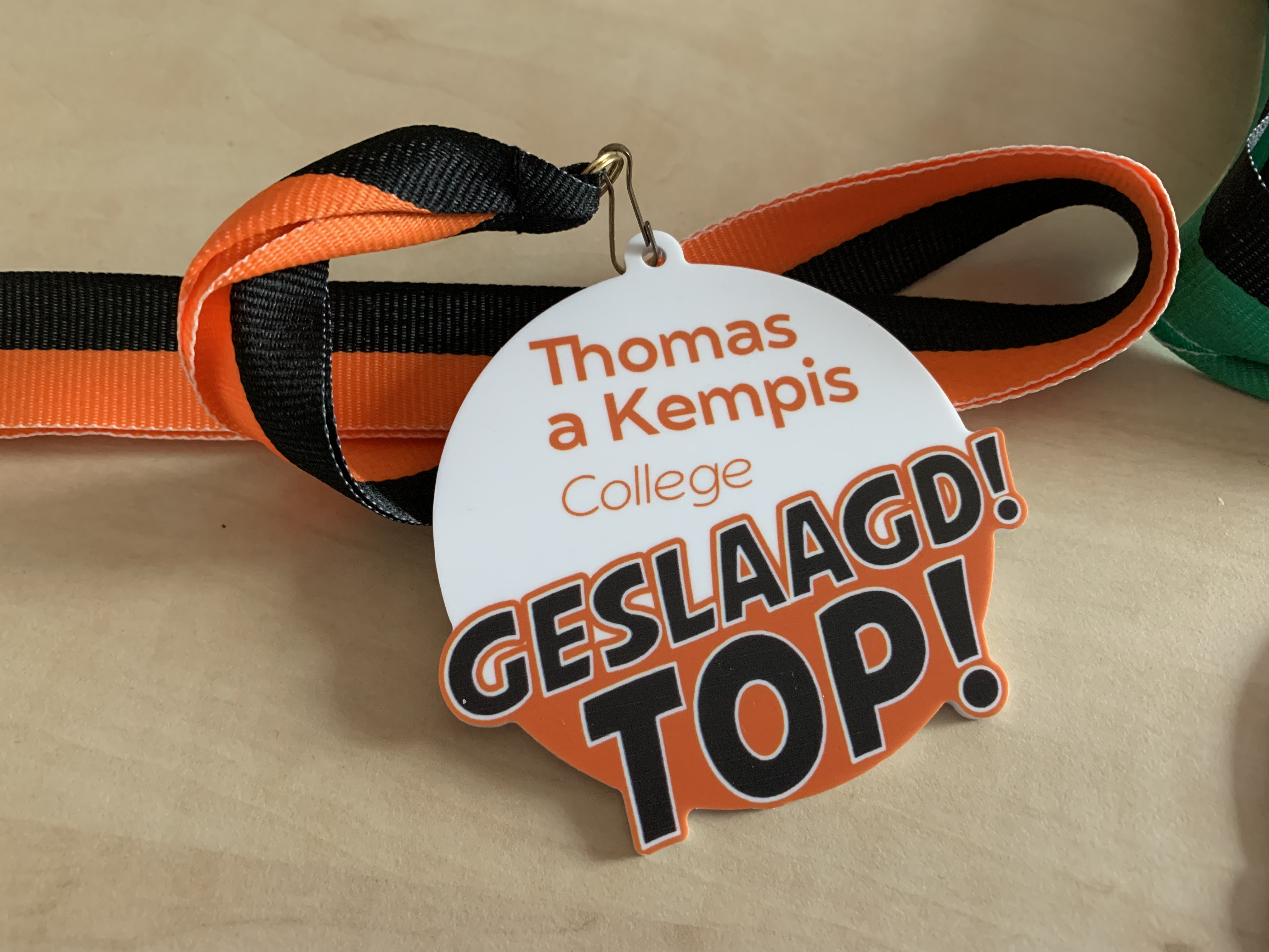 Geslaagd, vier het met een eigen medaille